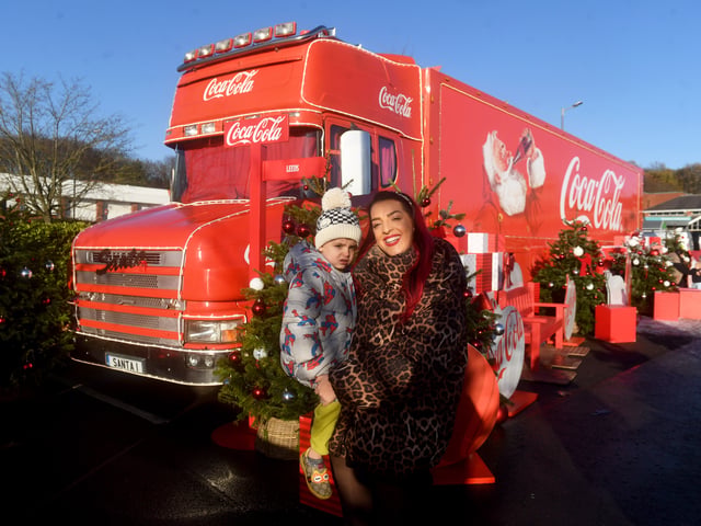 Kymberley Holmes with her son Luciano, aged three, pictured by the truck.

