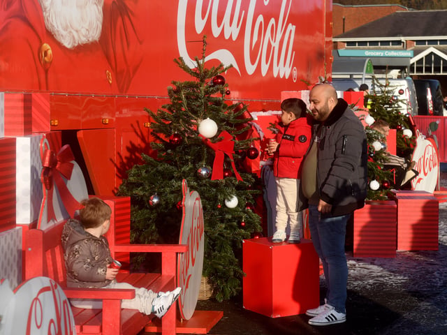 At every destination, the bright red truck transforms into a magical winter wonderland, decked with sparkling lights that make the perfect backdrop for festive selfies.