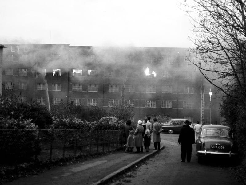 People watch the fire at the George IV whisky warehouse in South Queensferry in November 1965.