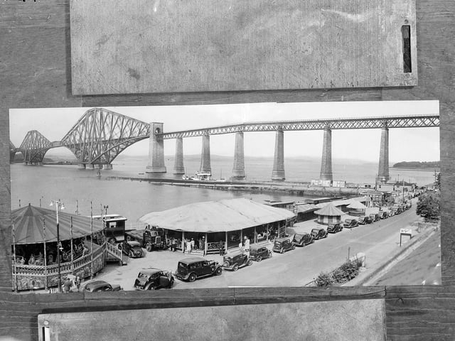 The South Queensferry Ferry Fair beneath the Forth Bridge in February 1958.