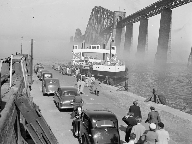 Cars queue at South Queensferry to board the ferry across the Forth in the days before the Forth Road Bridge in November 1956.