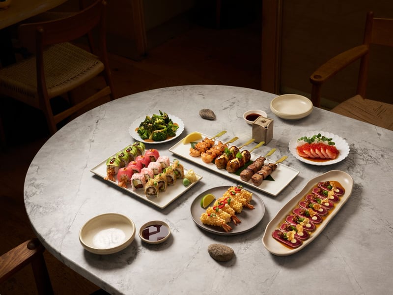 The menu is designed for sharing and caters to all tastes, from sushi and sashimi to grilled dishes and plant-based options