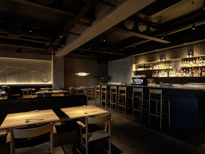 The bar downstairs is a more intimate space with cosy booths and counter seating.