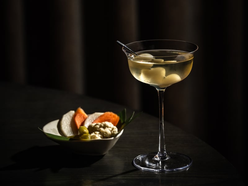 The Salmon Swim Upstream cocktail, with Sake Ono infused fresh daikon, Muyu jasmine and Ukiyo vodka served with pickles.