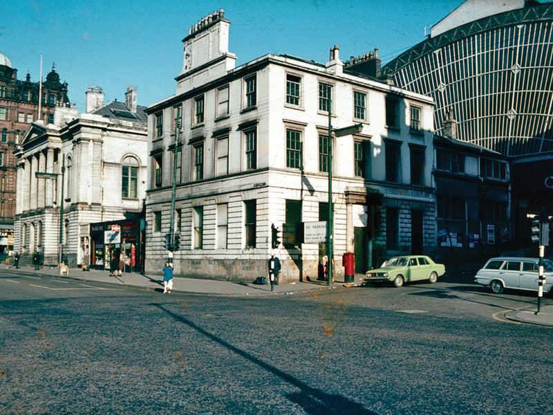 Queen Street Station, the Queen Street and West George Street  in 1970. These were what the public saw of the main entrance to the station until the 1970s. The block on the corner was built as an hotel.
