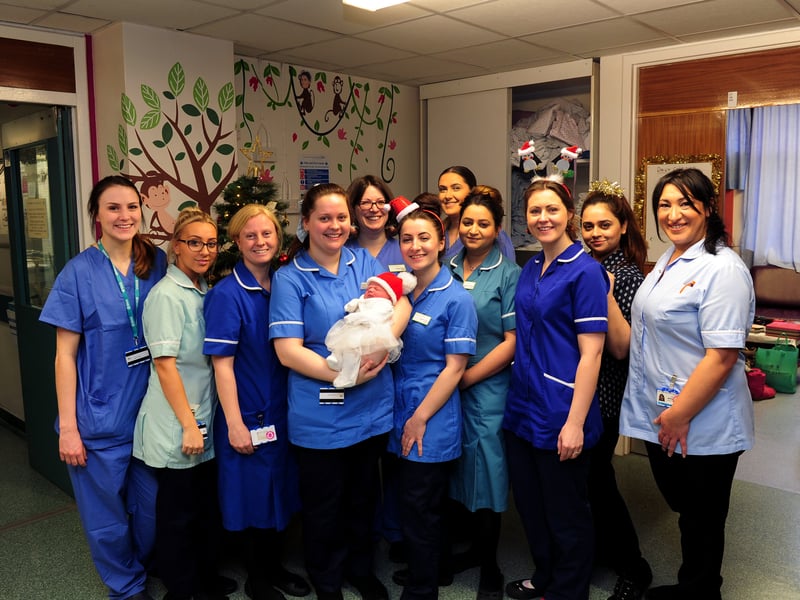 Nurses and staff at St James's Hospital pictured with Christmas Day baby Ada-May Ainsley-Moss, born at 12.43am in 2018. She weighed at 7lb 1oz.