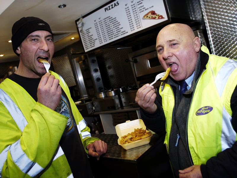 Adam Hugill and Tom Reid sample the chips at Antonio's, on Rose Street, Edinburgh, in February 2008