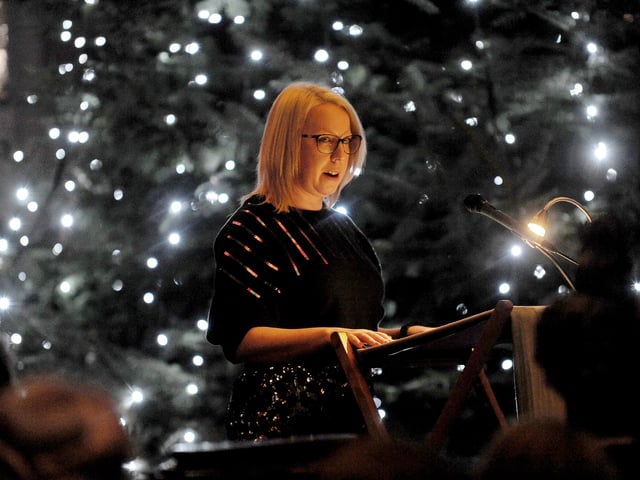 Laura Collins of the Yorkshire Evening Post gives a reading during the service.