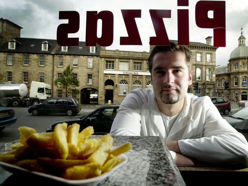 Adriano Crollo at his fish and chip shop and pizzeria on Bernard Street, Leith, in 2001