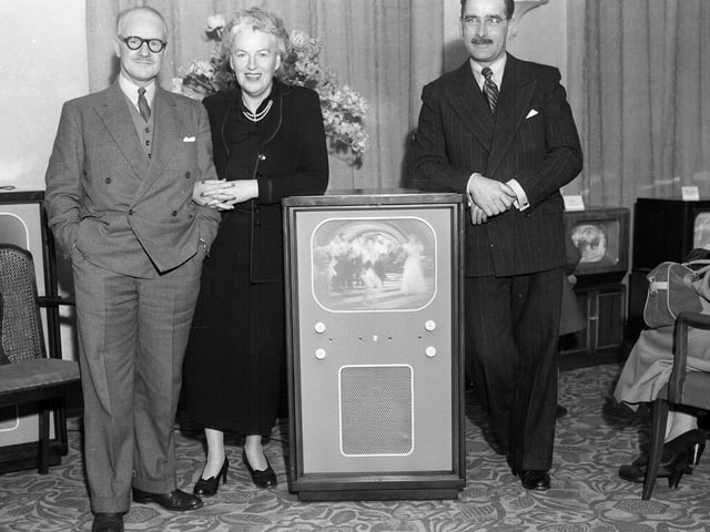 Gracie Fields checking out a TV set in Jenners in November 1952.