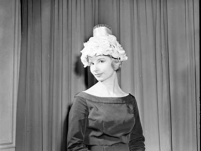 A dainty cloche composed of satin king cups is displayed at the Jenners Hat Show in March 1960.