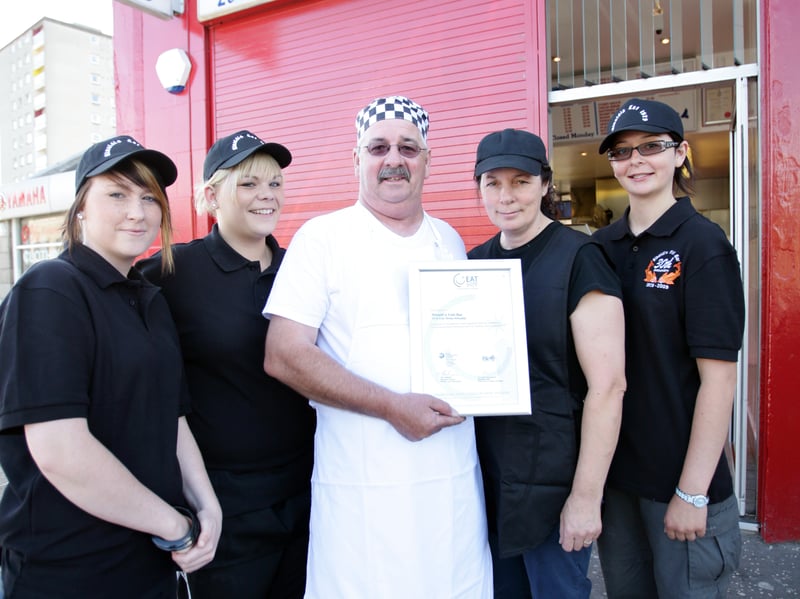 Staff at Rinaldi's fish and chip shop in Kirkcaldy after it was awarded the EAT SAFE AWARD by the FSA in 2009