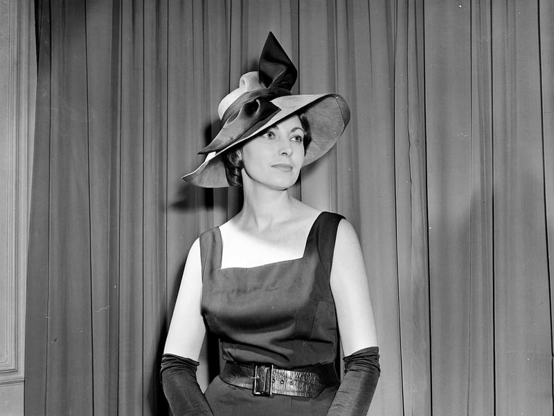 A coffee-coloured straw with black trimming being modelled at the Jenners Hat Show in March 1960.