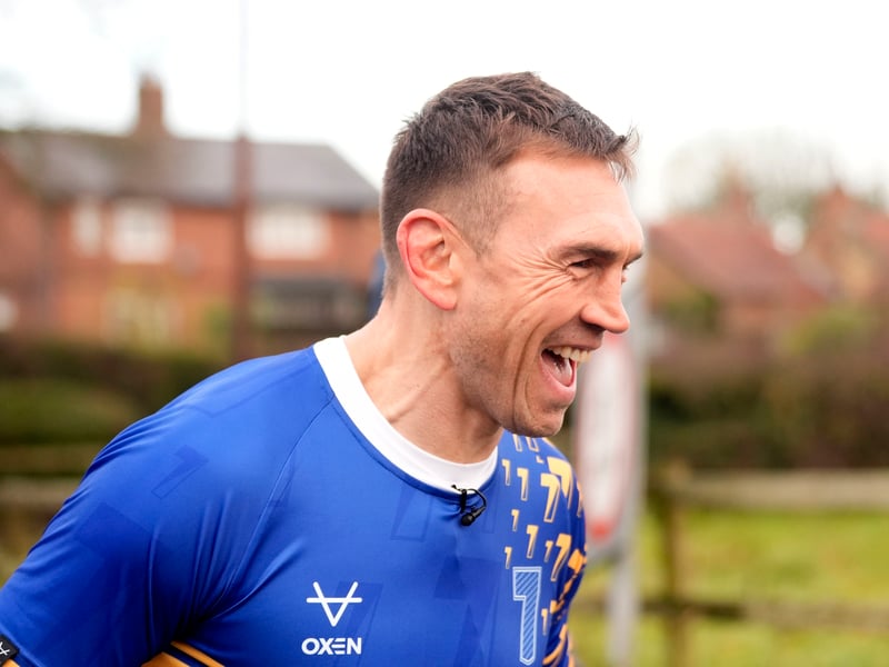 Kevin Sinfield as he runs through flood water in Cattal on day seven of the 7 in 7: Together 2025 Challenge in Leeds.