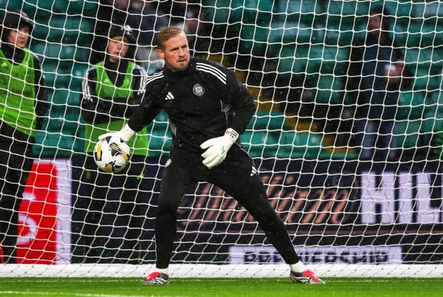 Goalkeeper had no chance with either Hearts goal. Made one decent save from Shankland. 6