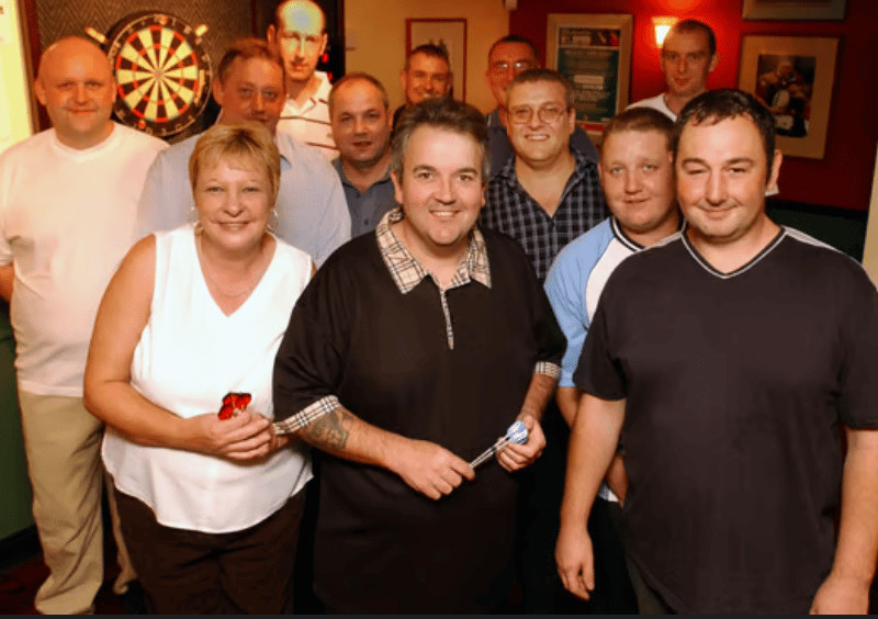 World darts champion Phil Taylor was a welcome visitor to the New Derby in 2003.