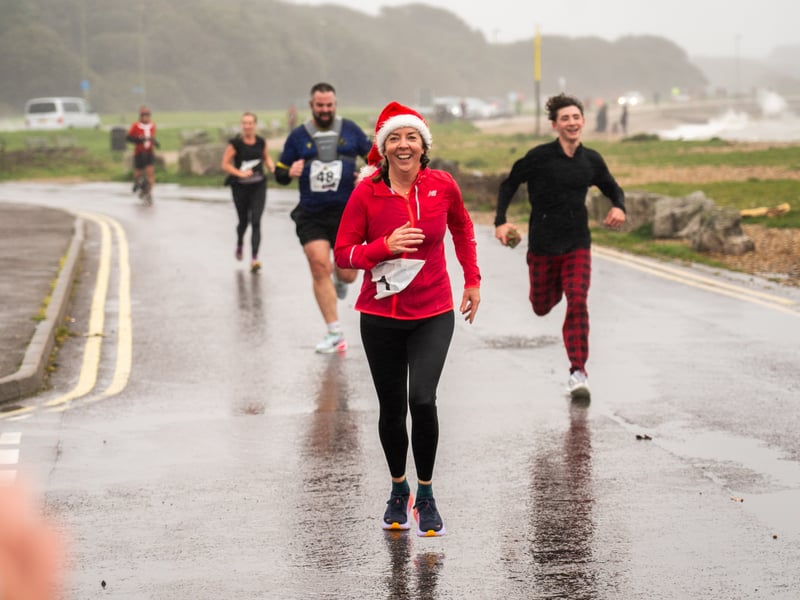 People braved the weather to take part in the Gosport Rotary Club's Christmas Pud 5k at Stokes Bay this weekend. 

Pictured: People taking part in the fun run. 


Picture: Alec Chapman