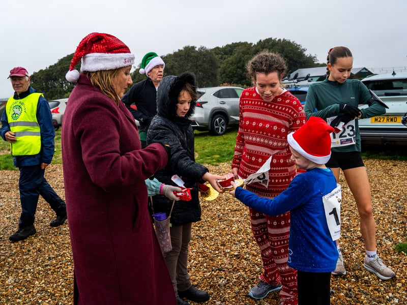 People braved the weather to take part in the Gosport Rotary Club's Christmas Pud 5k at Stokes Bay this weekend. 

Pictured: People taking part in the fun run. 


Picture: Alec Chapman