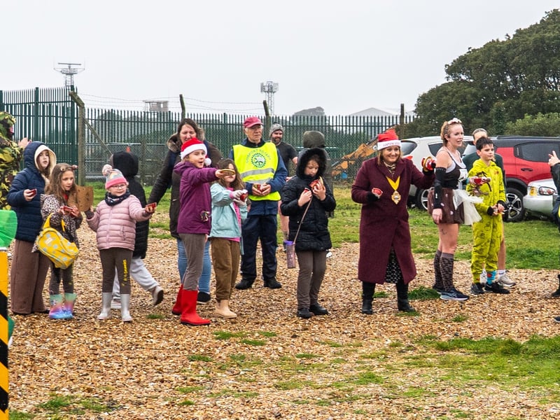 People braved the weather to take part in the Gosport Rotary Club's Christmas Pud 5k at Stokes Bay this weekend. 

Pictured: People taking part in the fun run. 


Picture: Alec Chapman