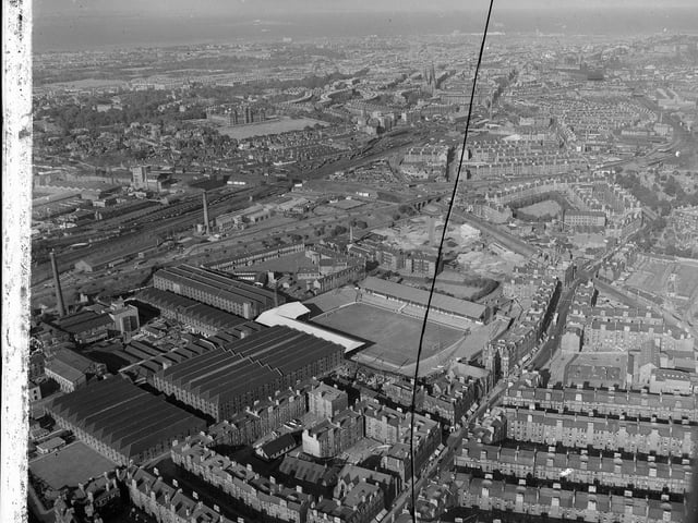 An aerial picture of Gorgie Road leading onto Dalry Road  with the Hearts football ground in foreground and looking over to the West End in November 1961.