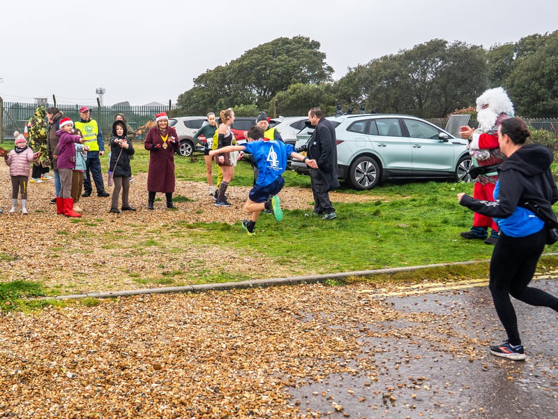 People braved the weather to take part in the Gosport Rotary Club's Christmas Pud 5k at Stokes Bay this weekend. 

Pictured: People taking part in the fun run. 


Picture: Alec Chapman