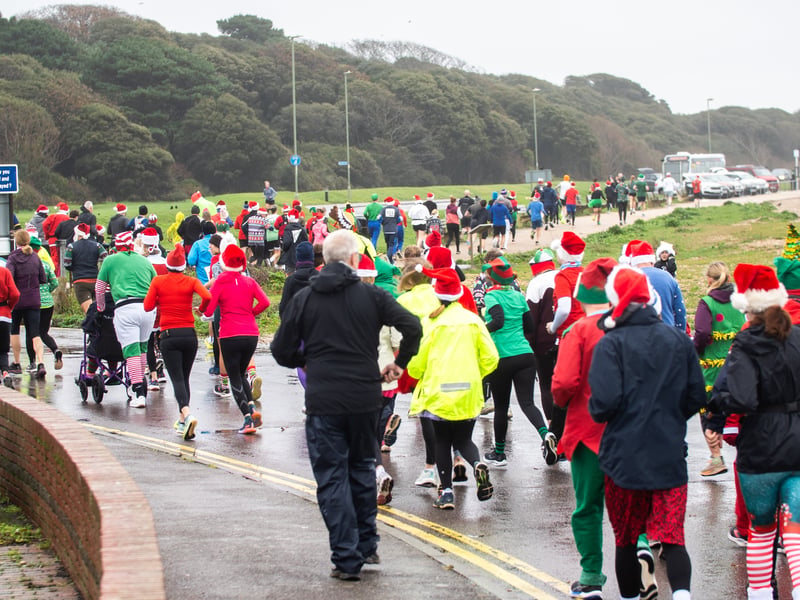 People braved the weather to take part in the Gosport Rotary Club's Christmas Pud 5k at Stokes Bay this weekend. 

Pictured: People taking part in the fun run. 


Picture: Alec Chapman