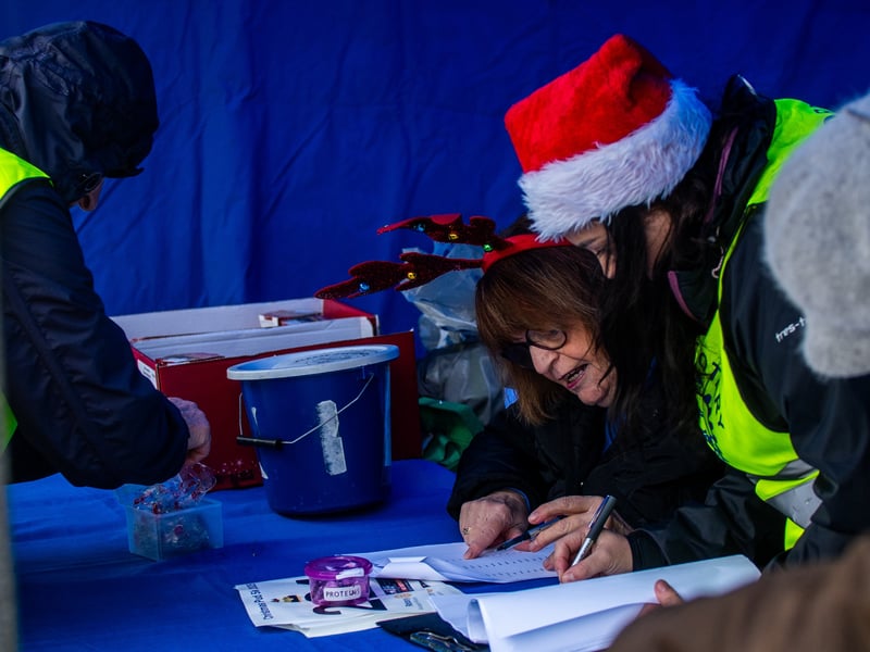 People braved the weather to take part in the Gosport Rotary Club's Christmas Pud 5k at Stokes Bay this weekend.
Pictured: People taking part in the fun run.
Picture: Alec Chapman