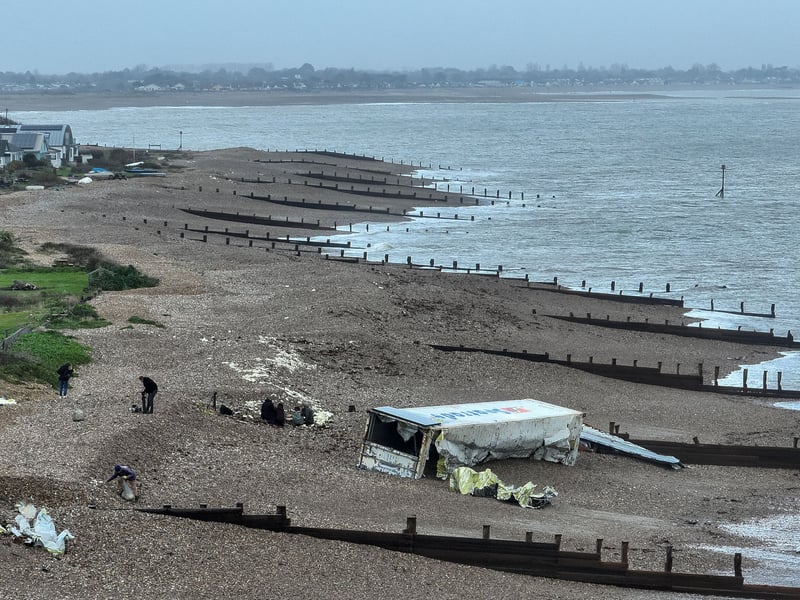 The clear up in progress on Selsey beach.