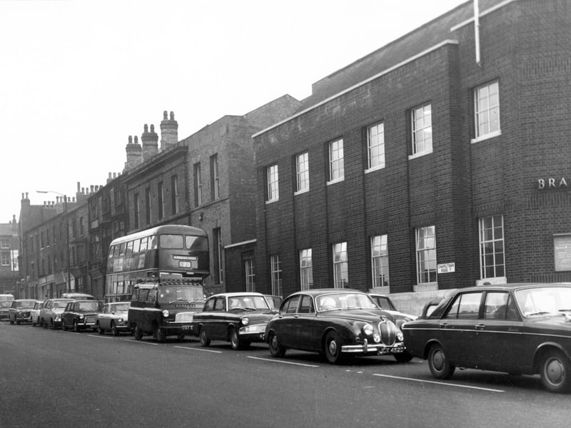 This view from November 1968 looks north-east along the east side of Chapeltown Road. Sheepscar Library is on the right. Cars and a number 20, Dewsbury Road bus are on the road.