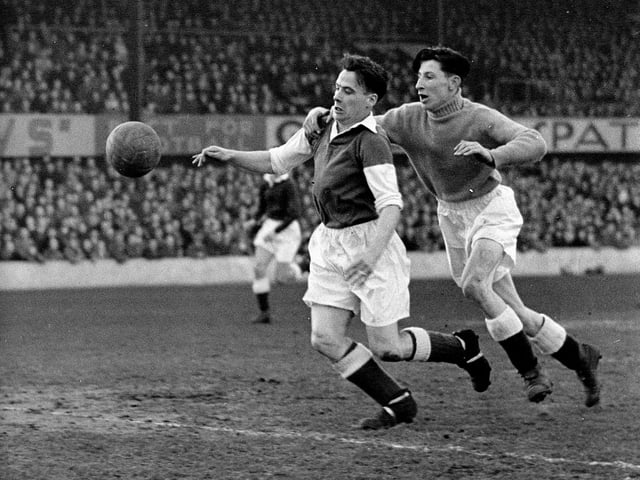 Hibs legend Lawrie Reilly scores after getting past Dundee keeper Billy Brown in March 1950. The game ended in a 4-2 win for Hibs.