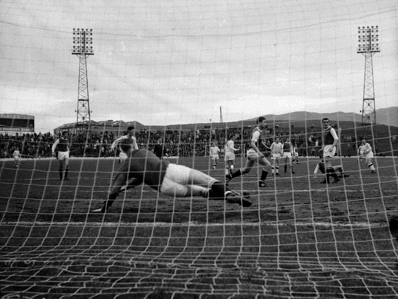 W Wilson dives for the balls at the Hibs v Dunfermline match at Easter Road in May 1964.