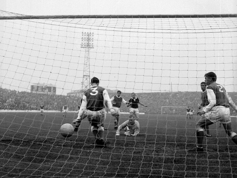 Alan Gordon scores Hearts' third goal against Hibs at Easter Road in September 1964.
