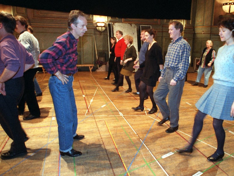 Derek Hartley leading Opera North Chorus how to tap dance.