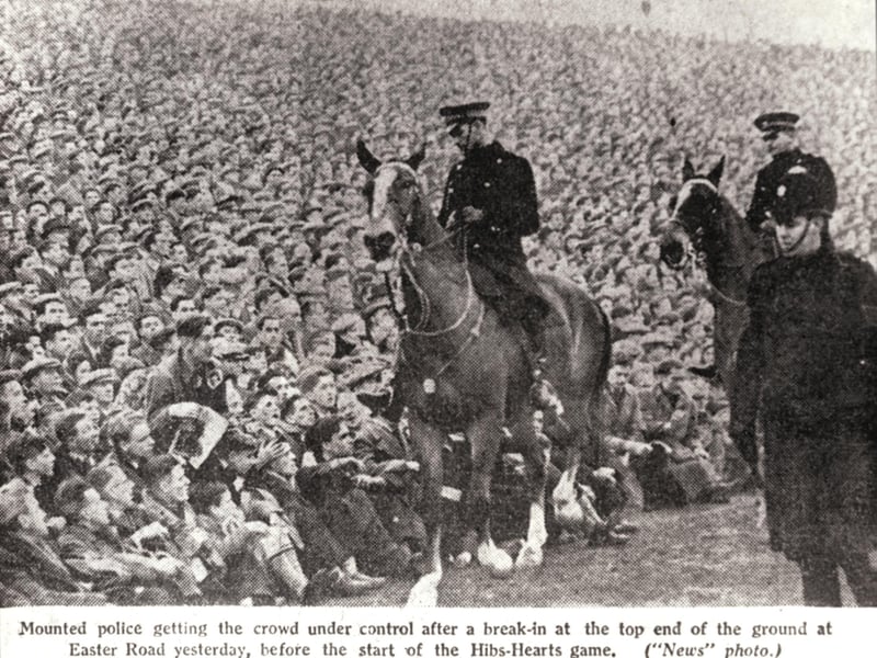 Mounted police keep an eye on the crowds at Easter Road at an Edinburgh derby Hibs v Hearts football match at Easter Road in January 1950. A record attendance of more than 65,000 fans saw Hearts win the match 1-2.