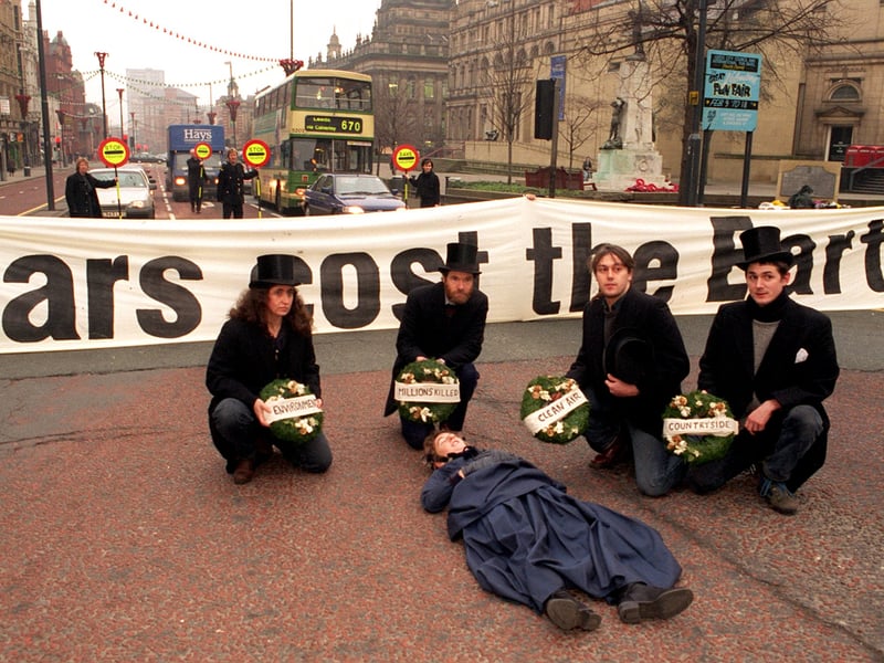 Leeds members of Friends of the Earth stage a demonstration on the 100th year of the car, by stretching a banner across The Headrow. It mourned the death of Bridget Driscoll, the first person to be killed by a car in 1896 which was travelling at just four miles per hour.
