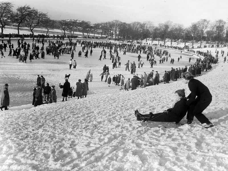 Hundreds of people take advantage of the winter weather to go skating on Inverleith Pond in January 1955.