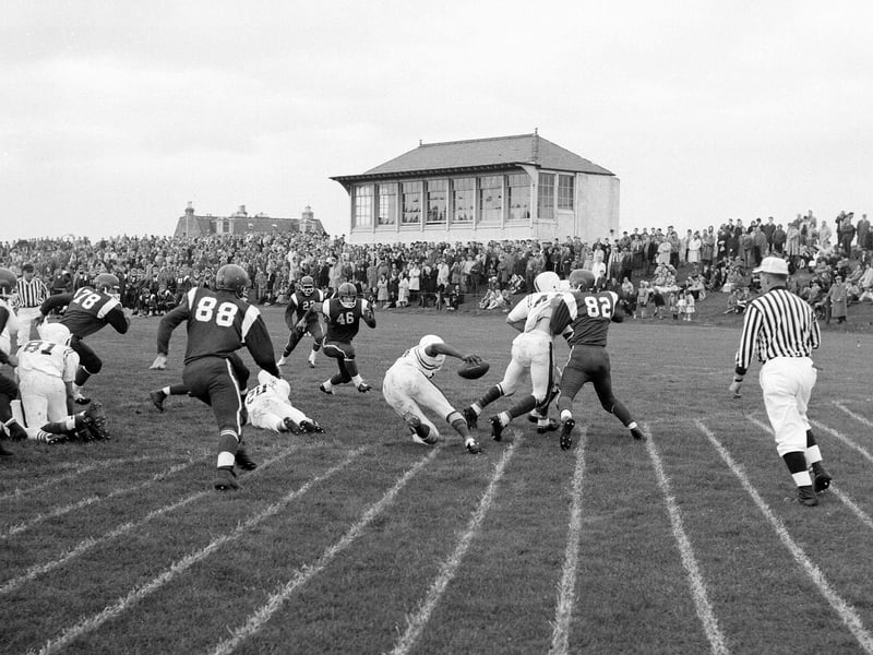 Playing American Football in Inverleith Park in August 1963.
