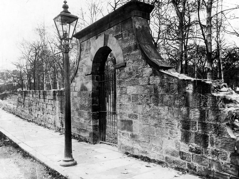 A view of the boundary wall to Roundhay Park on Wetherby Road in November 1924. Wrought iron gate which gave access to the bathing pool.