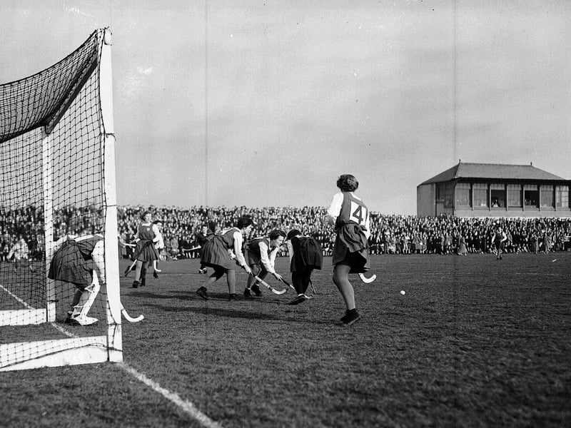 The Scottish women's hockey team play the Irish hockey women's team in Inverleith in March 1956.