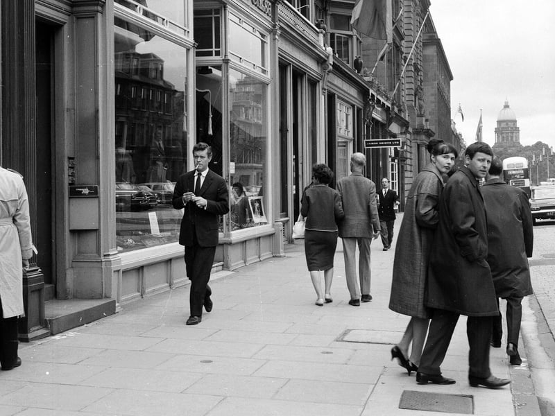 Actor Paul Massie walks down George Street, on his way to perform in the play 'Rabbit Race' at the Assembly Halls, during the 1963 Edinburgh Festival.