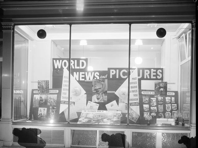 A window display in George Street featuring photographs from The Scotsman and publicising the work of Post Office Radio in November 1961.