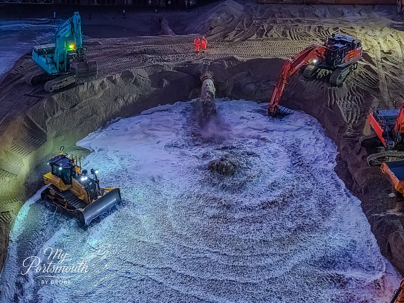 Shingle is pumped onto Southsea Beach to help to double its size