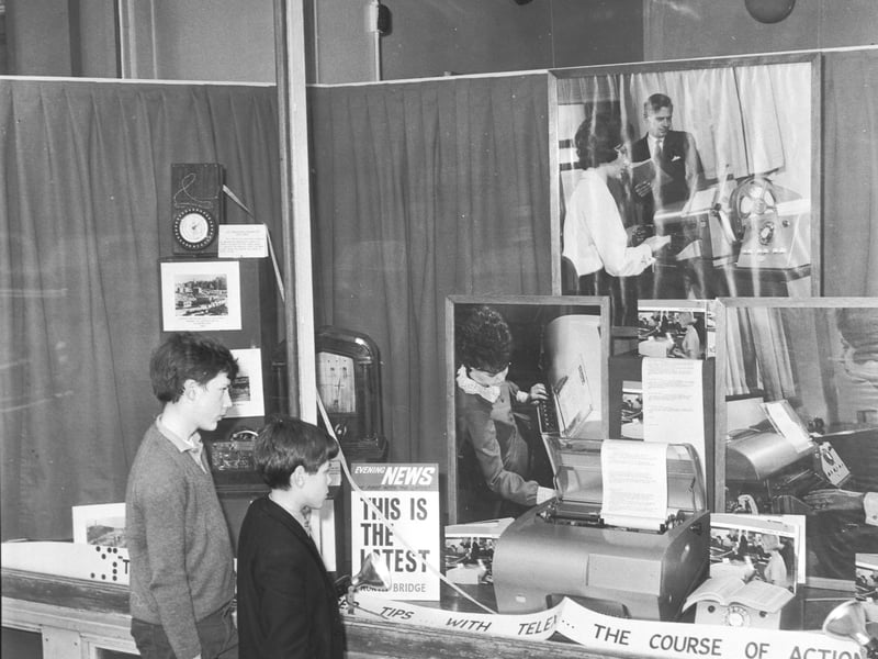 Two children look at the new GPO Telex machine displayed at 118 George Street in March 1966.
