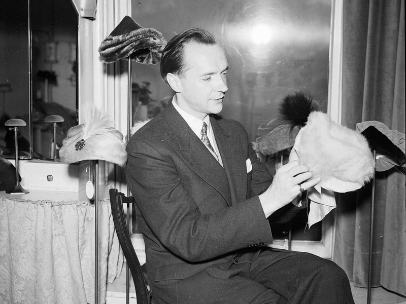 Milliner and hairdresser Edward French with some hats at his shop in George Street in June 1953.