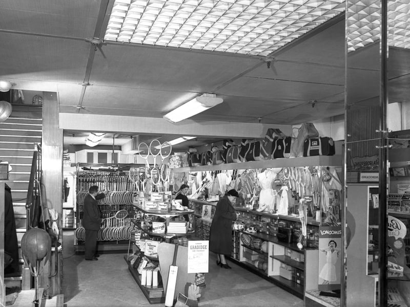 The sports department of the Barnsley Co-op in 1957. Dunlop and Slazenger racquets, and cricket bats from Gradidge are among the goods on display.