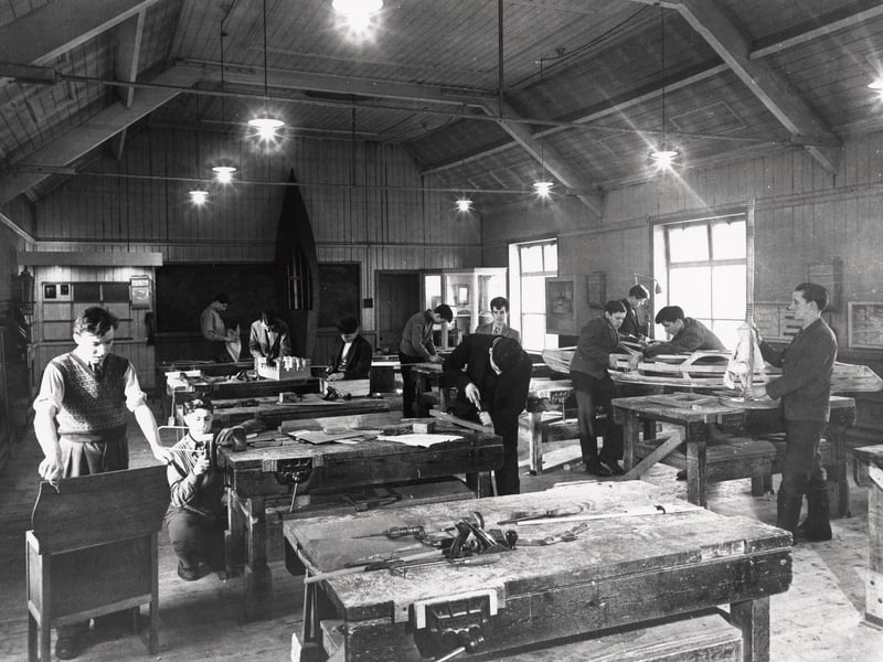 A woodwork lesson at Rowntree's day continuation school, York, in 1956. Day continuation schools provided young people who'd left full-time schooling early to learn vocational skills while working.