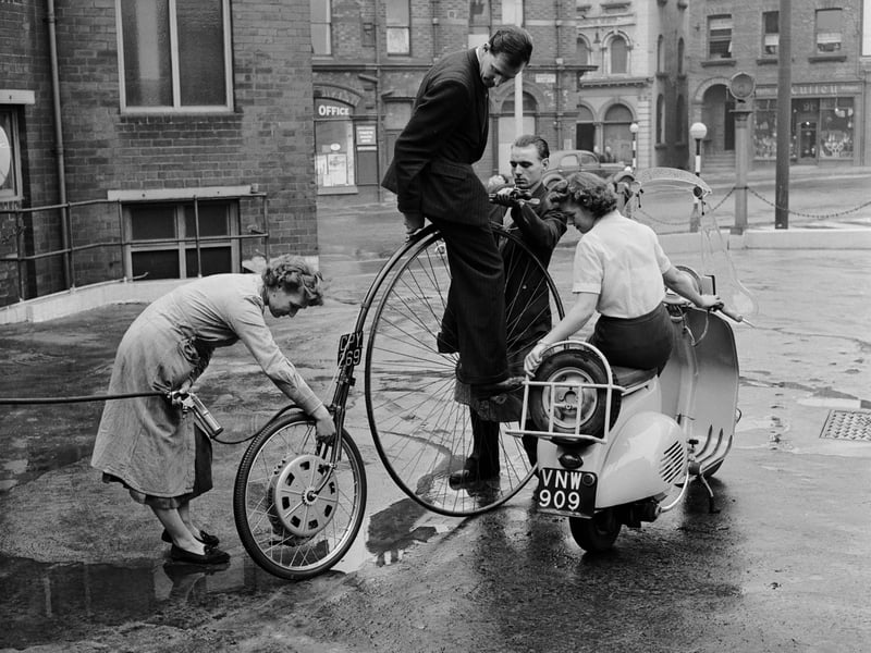 A motorised Penny Farthing, customised by Rowland Winn, a garage owner from Leeds, in 1955. The rear wheel is a normal cycle wheel fitted with a small hub motor.