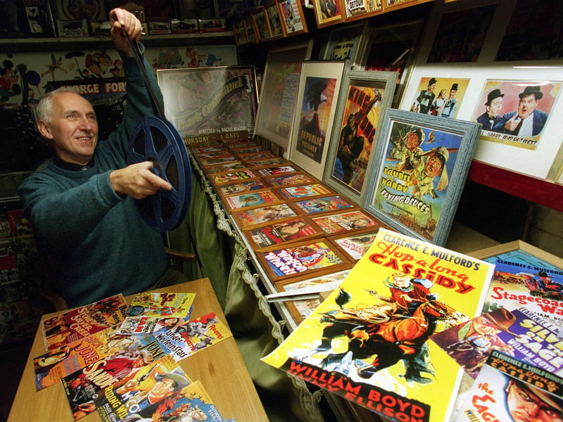 Film fan David Ryder with some of his film posters including Hop-a-long Cassidy. Pictured in October 1998.