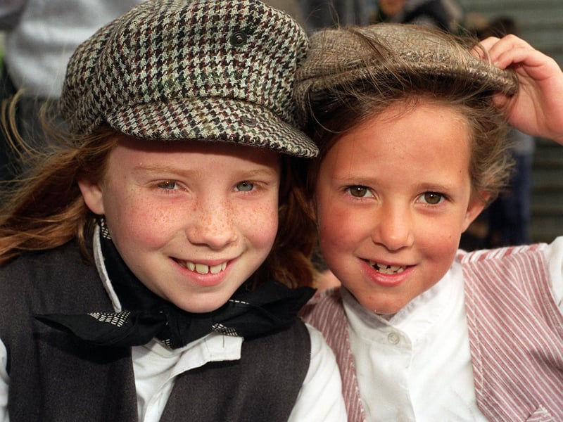 Rebecca Peacock, left, and Lauren Clark on the Rawdon Amateur Operatic Society Oliver themed float during the Guiseley Carnival parade in June 1996.