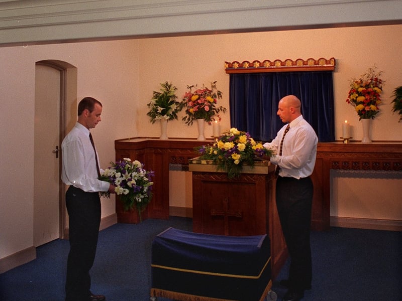 Technicians Robert Brown, left, and Matt Walsh arranging flowers in the chapel at the Rawdon Crematorium for an open day in September 1997.